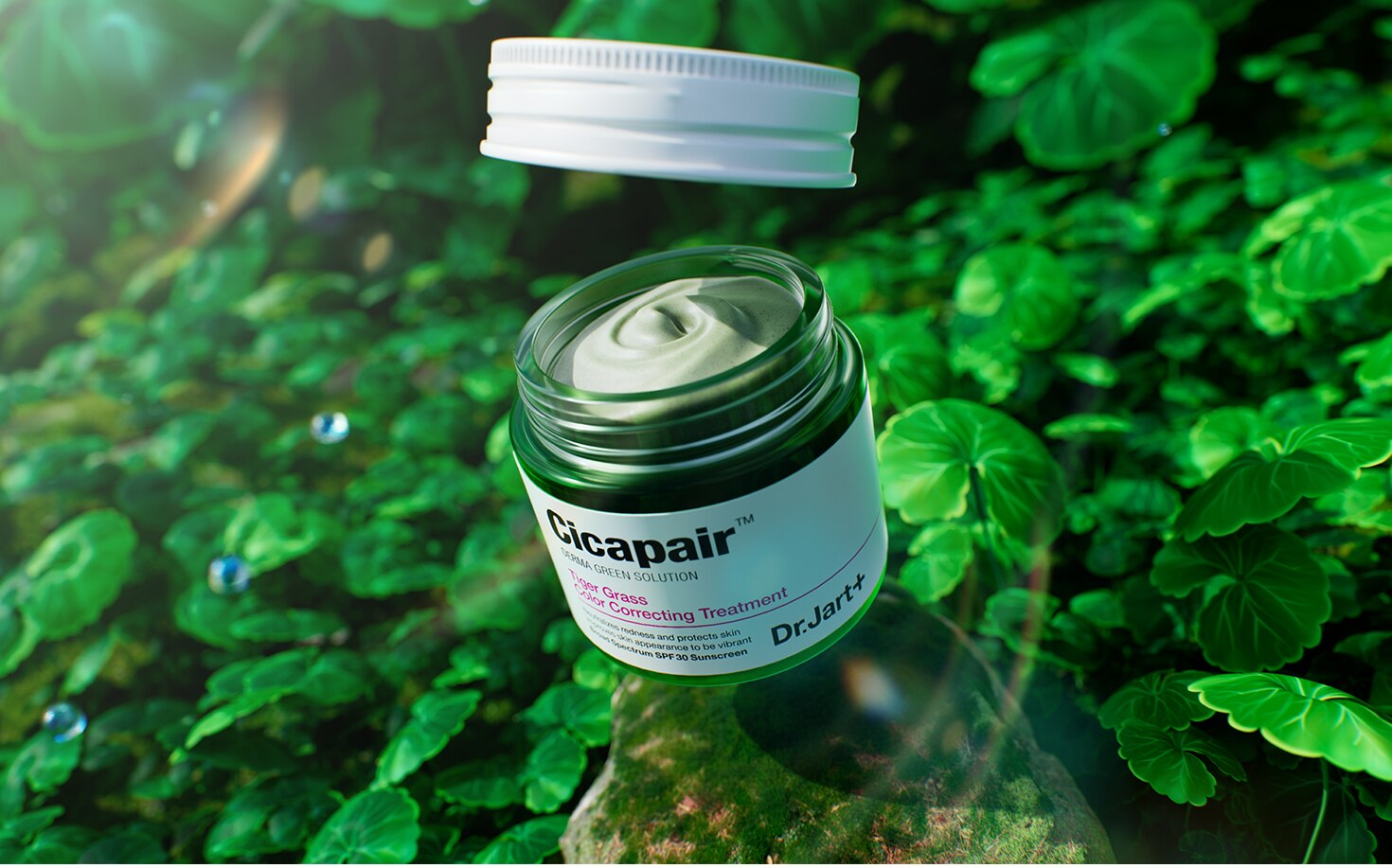 Cicapair Camo Drops bottle and Color Correcting Treatment jar with ombre back drop. Open containers reveal smooth, green texture