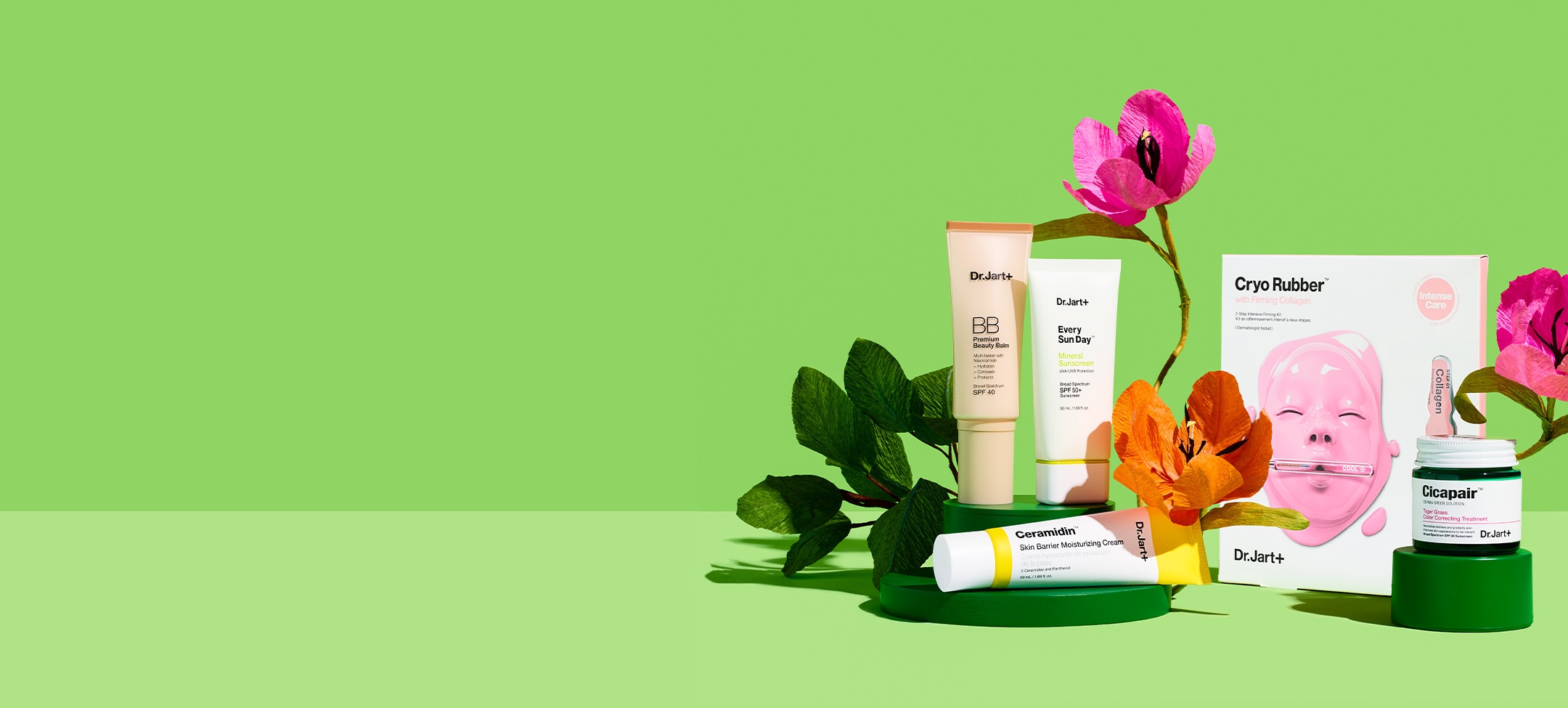 Dr.Jart+ bestselling moisturizers, mask and face sunscreen displayed alongside brightly colored flowers