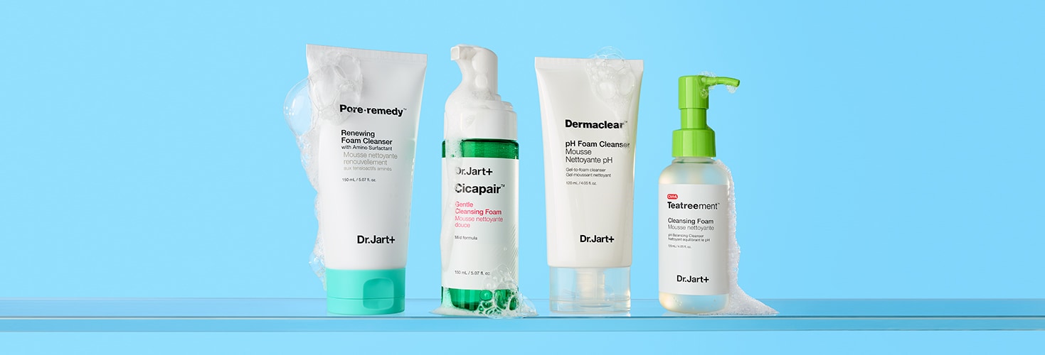 Dr.Jart+'s collection of skincare cleansers are displayed in a row with their textures showing.