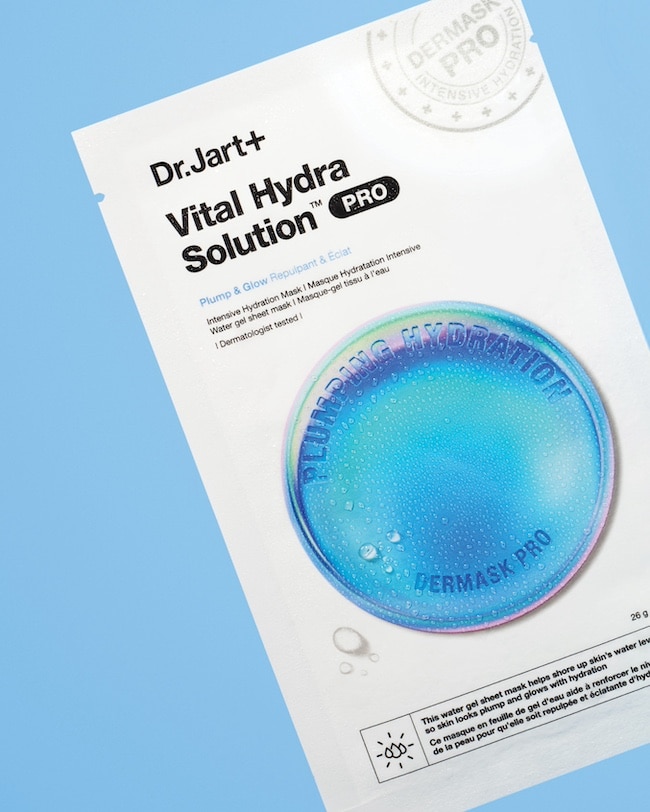 Vital Hydra Solution Face Mask is displayed on blue background