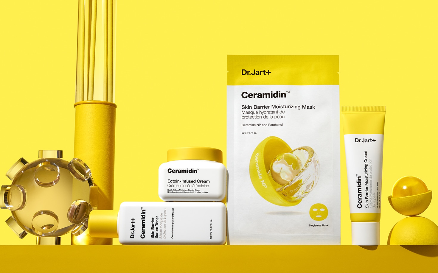 Ceramidin collection moisturizers for dry skin, masks stand in front of a gold chrome background.