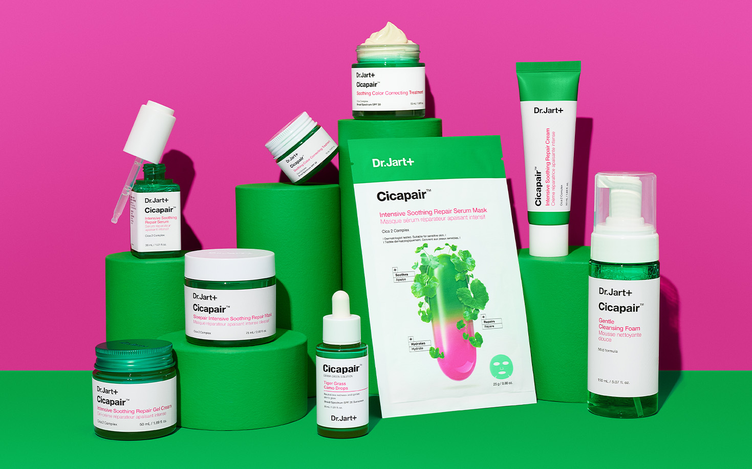 Collection of Cicapair products displayed on a bright pink background. 
