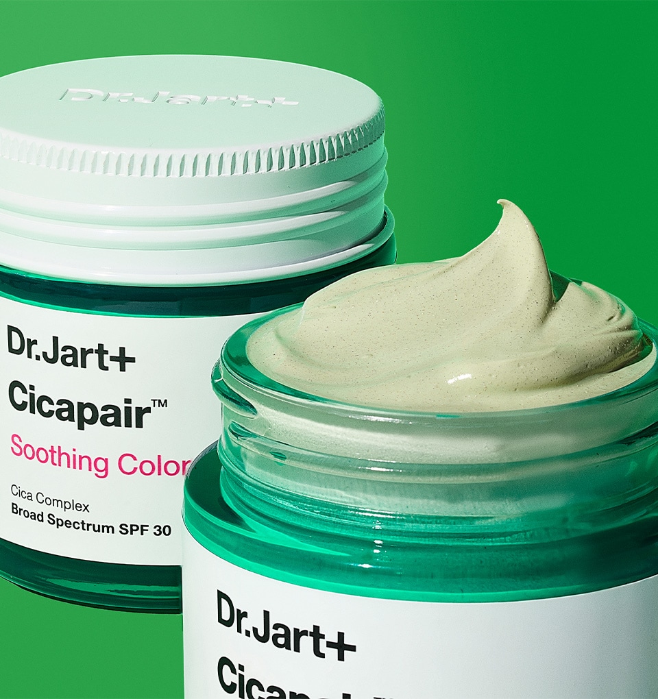 Dr.Jart+ upgraded formula is displayed on a green background & opened to show the even creamier texture. 