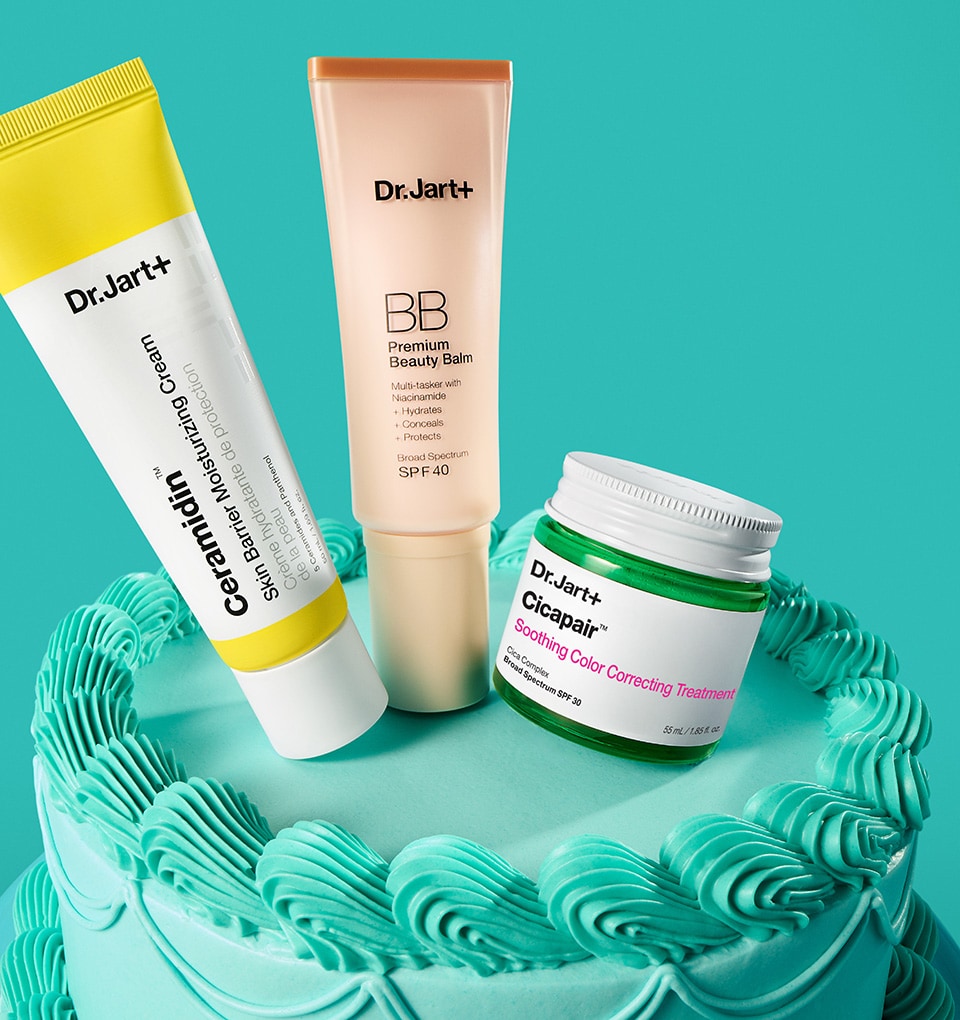 Dr. Jart+ color correctors & moisturizer are displayed atop a birthday cake.