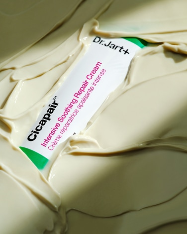 Ceramidin Moisturizer is shown floating amongst water droplets to depict hydration.