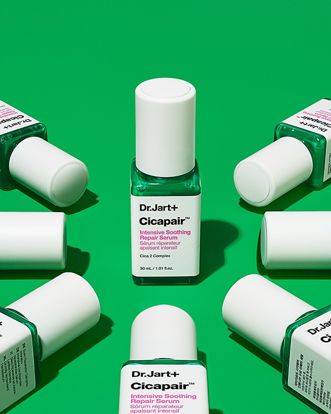 Cicapair Serum bottles displayed on a green background