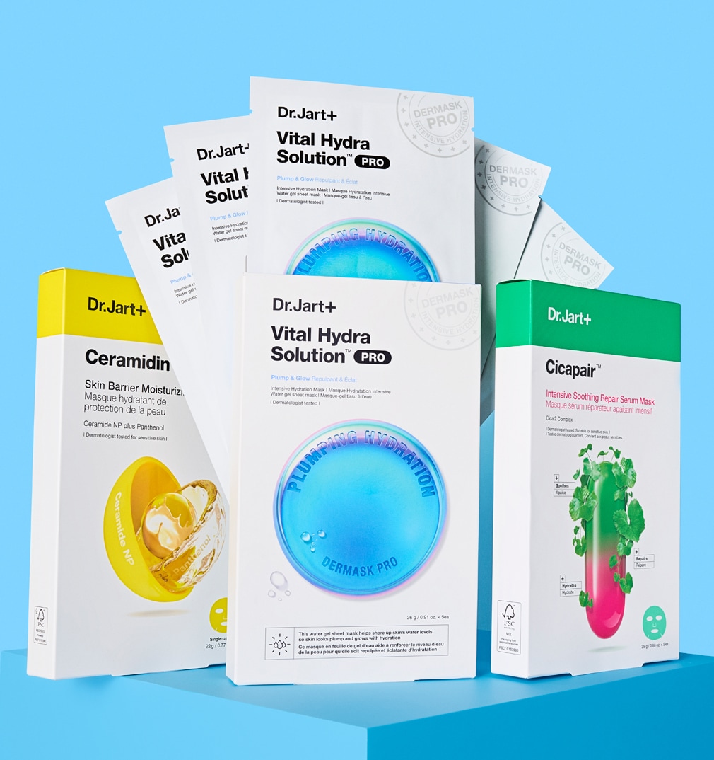 A variety of Dr.Jart+ skincare face masks are laid out on brightly colored background