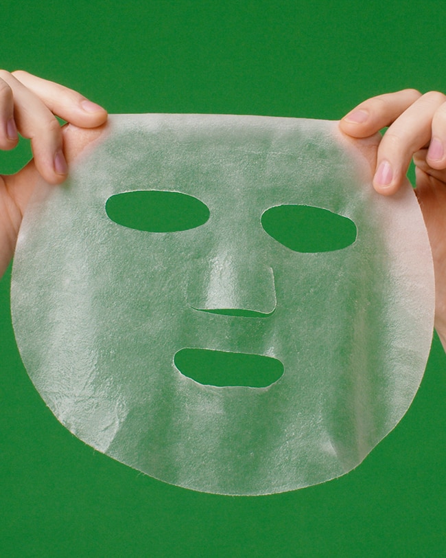 Face mask is displayed to emphasize the full size and thin material of the mask.